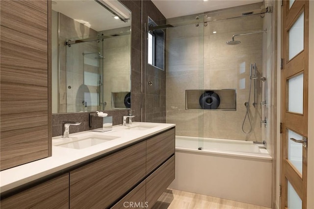 501 Ocean Ave, Seal Beach, CA 90740 - bathroom featuring bath / shower combo with glass door, double vanity, and tile walls