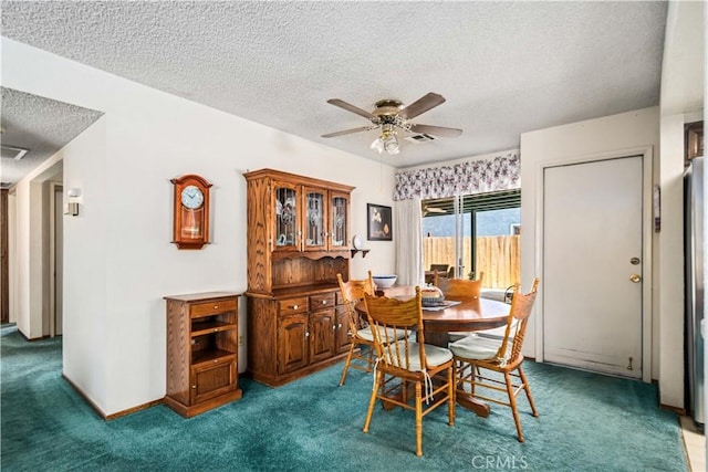 37229 Dalzell St, Palmdale, CA 93550 - dining area featuring a textured ceiling, carpet flooring, and a ceiling fan