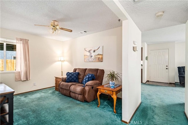 37229 Dalzell St, Palmdale, CA 93550 - carpeted living room with a textured ceiling and a ceiling fan