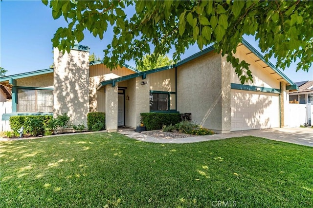 37229 Dalzell St, Palmdale, CA 93550 - mid-century home with a garage, concrete driveway, a chimney, a front yard, and stucco siding
