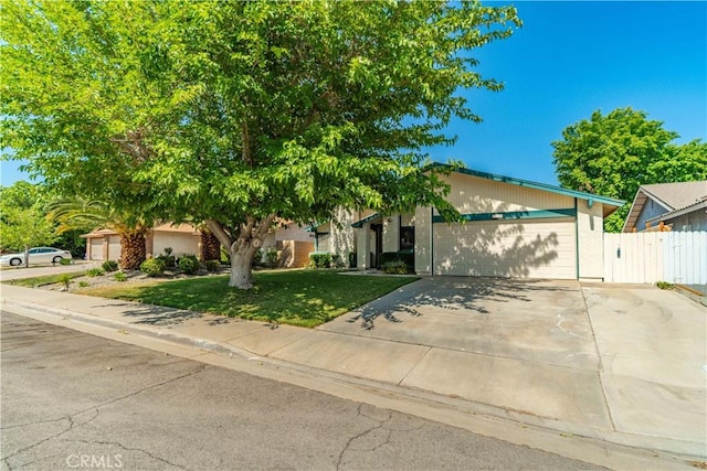 37229 Dalzell St, Palmdale, CA 93550 - view of front of home featuring an attached garage and driveway