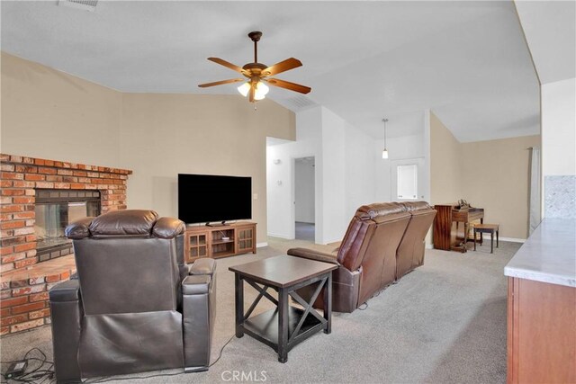 14480 Nevada Rd, Phelan, CA 92371 - living room with vaulted ceiling, a ceiling fan, light carpet, and a fireplace