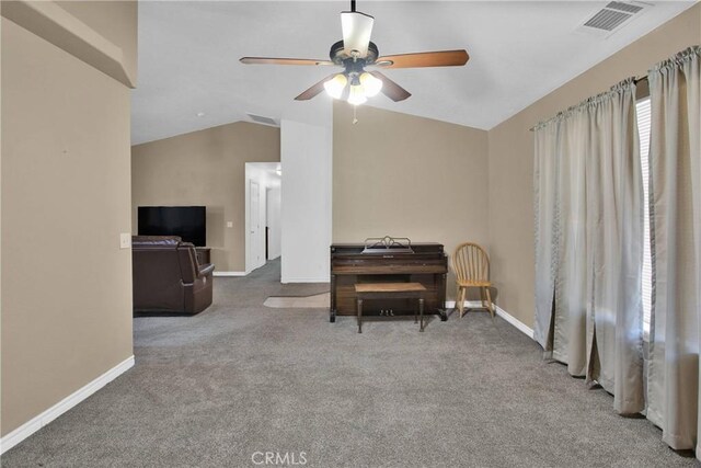14480 Nevada Rd, Phelan, CA 92371 - living area featuring a ceiling fan, vaulted ceiling, and carpet floors