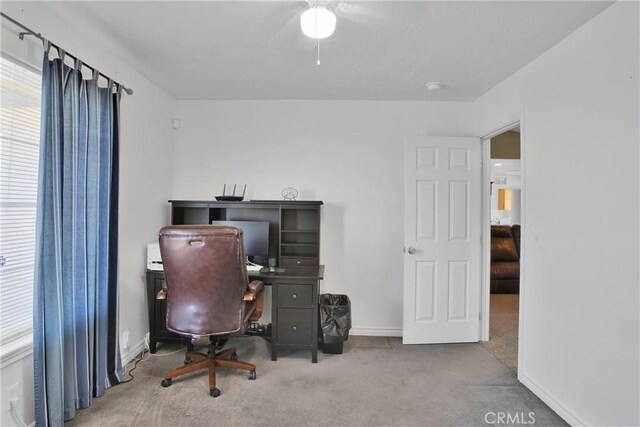 14480 Nevada Rd, Phelan, CA 92371 - carpeted home office with baseboards and a ceiling fan