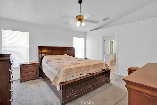 14480 Nevada Rd, Phelan, CA 92371 - bedroom with light colored carpet, lofted ceiling, connected bathroom, and ceiling fan