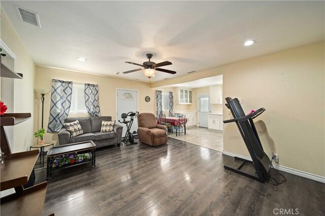 6838 Severn Dr, Paramount, CA 90723 - living area with ceiling fan, wood finished floors, plenty of natural light, and recessed lighting