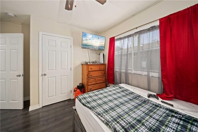 6838 Severn Dr, Paramount, CA 90723 - bedroom with dark wood finished floors and ceiling fan