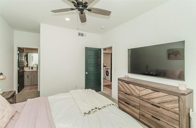 2887 E Tamarind Dr, Fresno, CA 93730 - bedroom with ensuite bath, ceiling fan, and washer and dryer
