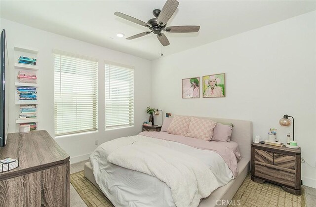 2887 E Tamarind Dr, Fresno, CA 93730 - bedroom with light colored carpet, a ceiling fan, and recessed lighting