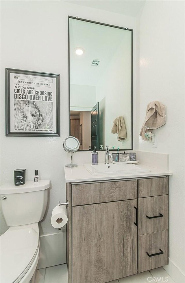 2887 E Tamarind Dr, Fresno, CA 93730 - bathroom with vanity and tile patterned flooring