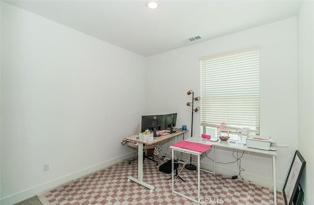 2887 E Tamarind Dr, Fresno, CA 93730 - home office featuring baseboards and carpet