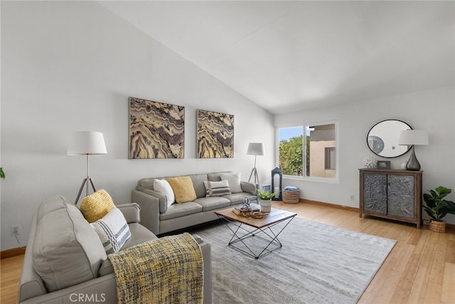 5650 Sumner Way Unit 309, Culver City, CA 90230 - living area with lofted ceiling and wood finished floors