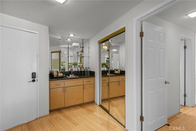 5650 Sumner Way Unit 309, Culver City, CA 90230 - bar featuring light wood-style floors and a sink