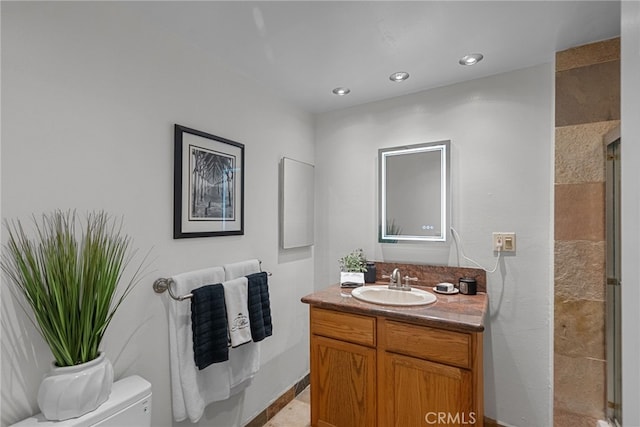 5650 Sumner Way Unit 309, Culver City, CA 90230 - bathroom featuring vanity, a shower stall, and recessed lighting