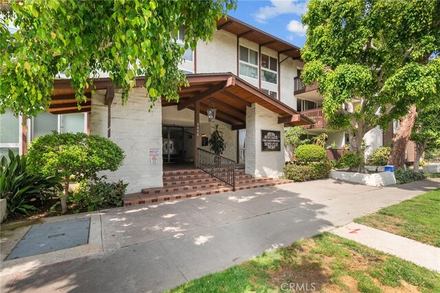 5650 Sumner Way Unit 309, Culver City, CA 90230 - view of front of house with stucco siding and stone siding