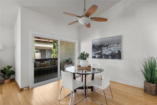 5650 Sumner Way Unit 309, Culver City, CA 90230 - dining room with wood-type flooring, a ceiling fan, and high vaulted ceiling
