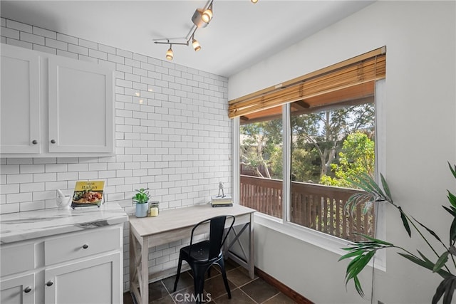 5650 Sumner Way Unit 309, Culver City, CA 90230 - office space featuring healthy amount of natural light, dark tile patterned floors, and track lighting