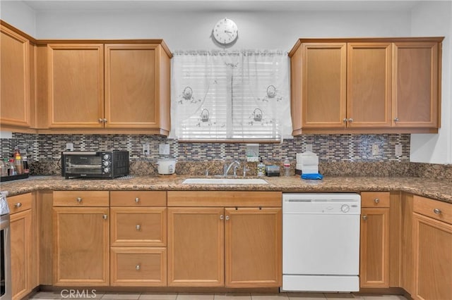 3739 Cherisa St, Perris, CA 92571 - kitchen with white dishwasher, tasteful backsplash, stone counters, and stove
