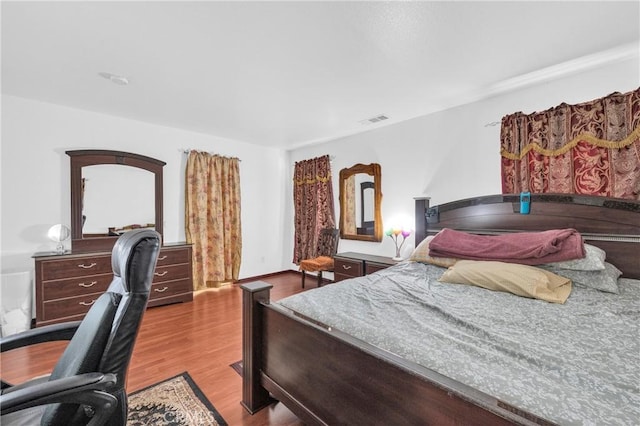 3739 Cherisa St, Perris, CA 92571 - bedroom featuring wood finished floors and an office area
