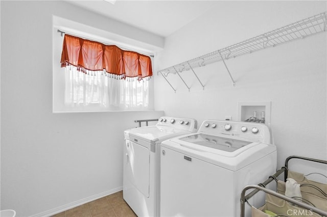 3739 Cherisa St, Perris, CA 92571 - washroom with washer and clothes dryer and baseboards