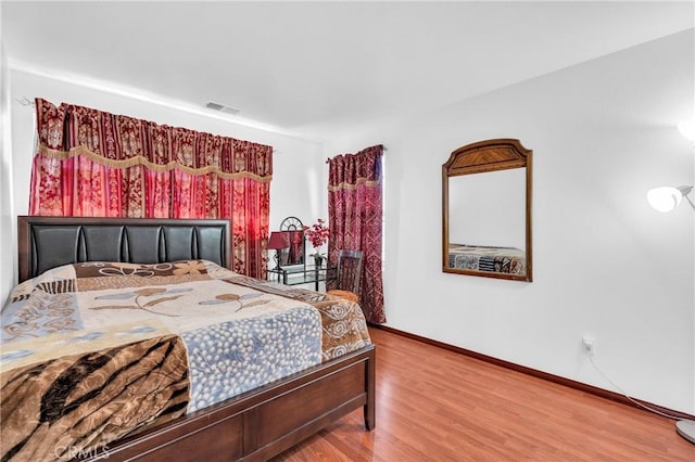3739 Cherisa St, Perris, CA 92571 - bedroom with wood finished floors and baseboards