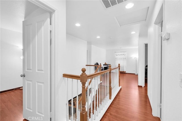 3739 Cherisa St, Perris, CA 92571 - corridor with an upstairs landing, wood finished floors, and recessed lighting