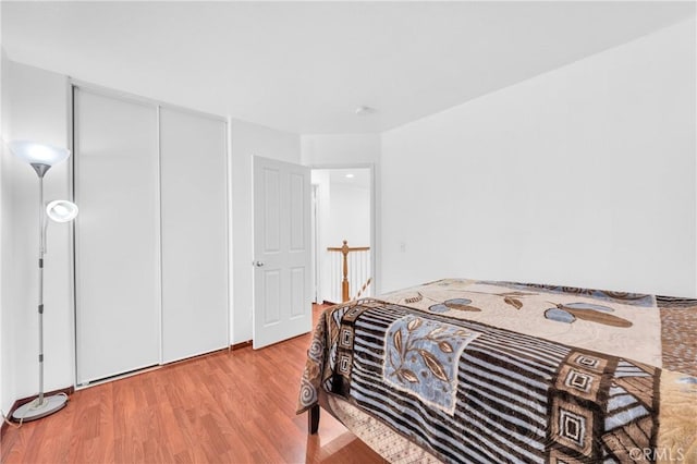 3739 Cherisa St, Perris, CA 92571 - bedroom featuring wood finished floors and a closet
