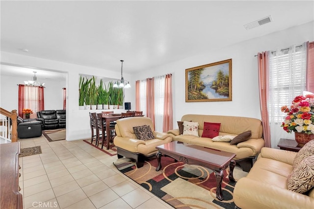 3739 Cherisa St, Perris, CA 92571 - living area featuring a chandelier and light tile patterned flooring