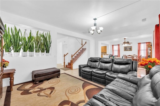 3739 Cherisa St, Perris, CA 92571 - living room with a chandelier, stairway, and ceiling fan
