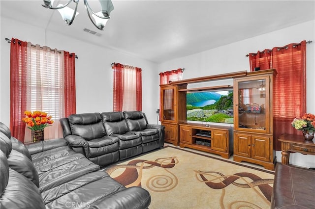 3739 Cherisa St, Perris, CA 92571 - living area featuring a chandelier and light colored carpet