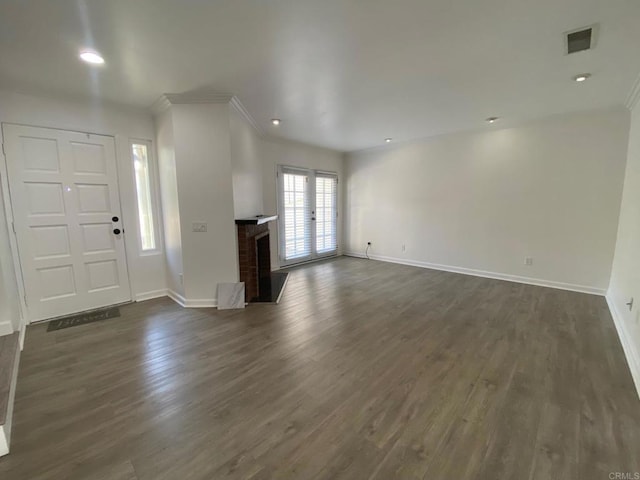 1447 Summit Dr, Chula Vista, CA 91910 - foyer entrance with crown molding, dark wood-style flooring, a brick fireplace, and recessed lighting