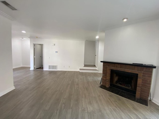 1447 Summit Dr, Chula Vista, CA 91910 - unfurnished living room featuring wood finished floors, recessed lighting, crown molding, and a brick fireplace
