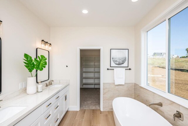 1904 Grey Rabbit Hollow Ln, Fallbrook, CA 92028 - full bath featuring double vanity, a freestanding bath, recessed lighting, and a spacious closet