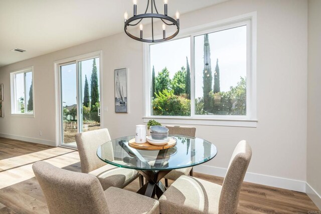 1904 Grey Rabbit Hollow Ln, Fallbrook, CA 92028 - dining area with a chandelier and wood finished floors