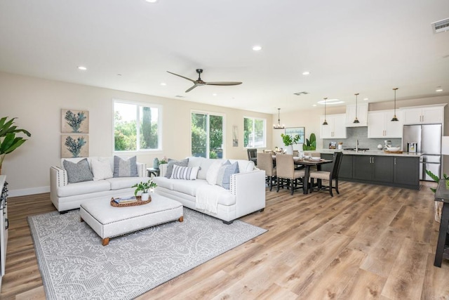 1904 Grey Rabbit Hollow Ln, Fallbrook, CA 92028 - living room with ceiling fan, light wood-style flooring, and recessed lighting