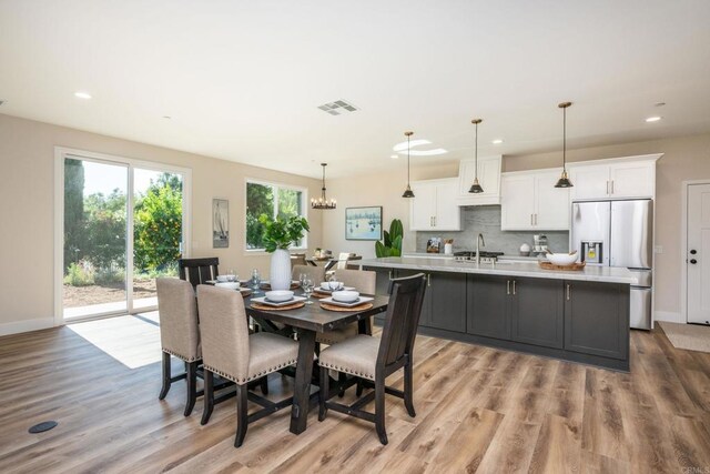 1904 Grey Rabbit Hollow Ln, Fallbrook, CA 92028 - dining room featuring light wood finished floors, recessed lighting, and a chandelier