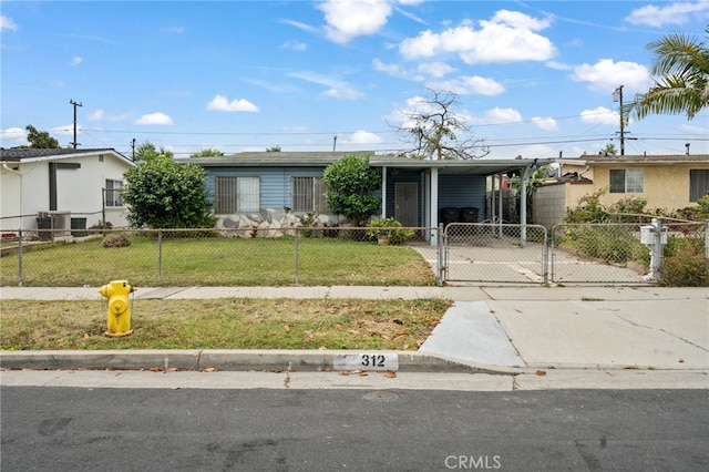 312 W 234th Pl, Carson, CA 90745 - ranch-style home with a fenced front yard, concrete driveway, a gate, and a carport