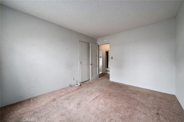 312 W 234th Pl, Carson, CA 90745 - empty room featuring carpet and a textured ceiling