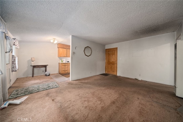 312 W 234th Pl, Carson, CA 90745 - unfurnished living room with carpet, a heating unit, and a textured ceiling