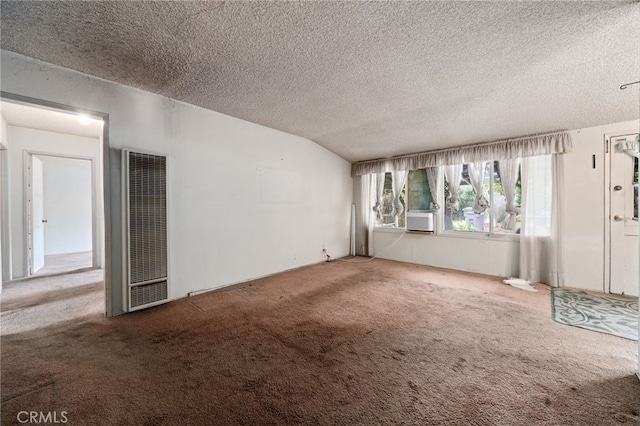 312 W 234th Pl, Carson, CA 90745 - unfurnished living room featuring a heating unit, carpet floors, and a textured ceiling