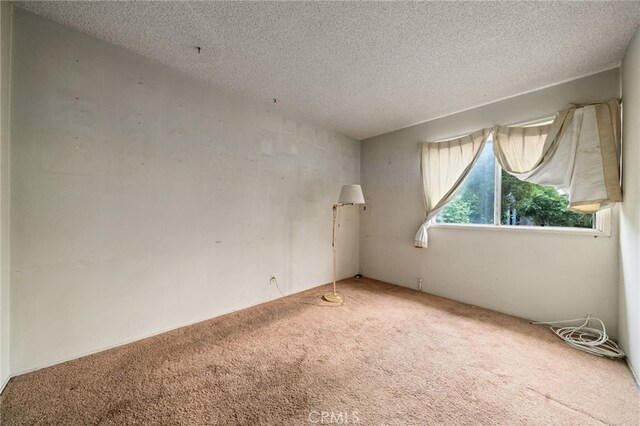 312 W 234th Pl, Carson, CA 90745 - carpeted spare room with a textured ceiling
