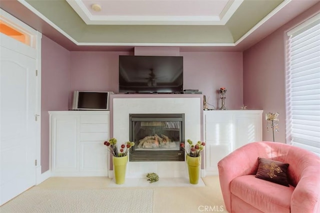325 Juanita Ave, Oceano, CA 93445 - living area with carpet flooring, a fireplace with flush hearth, ornamental molding, and a raised ceiling
