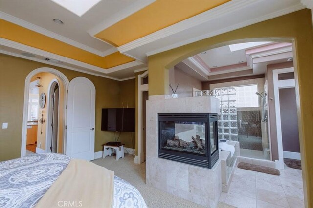 325 Juanita Ave, Oceano, CA 93445 - bedroom with arched walkways, a multi sided fireplace, crown molding, and a raised ceiling