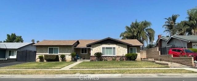 7430 Leucite Ave, Rancho Cucamonga, CA 91730 - ranch-style home featuring a gate and stucco siding