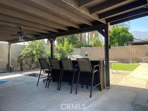 7430 Leucite Ave, Rancho Cucamonga, CA 91730 - view of patio / terrace with a mountain view and a ceiling fan