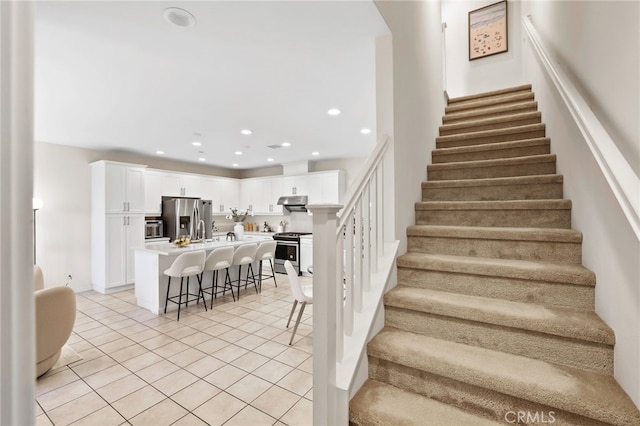 105 High Mdw, Lake Forest, CA 92610 - staircase featuring tile patterned floors and recessed lighting