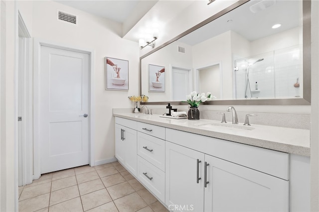 105 High Mdw, Lake Forest, CA 92610 - bathroom featuring double vanity, a shower stall, and tile patterned flooring