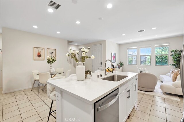 105 High Mdw, Lake Forest, CA 92610 - kitchen featuring dishwasher, open floor plan, light tile patterned floors, a breakfast bar area, and recessed lighting