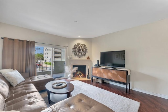 13200 Moorpark St Unit 201, Sherman Oaks, CA 91423 - living room featuring wood finished floors and a warm lit fireplace