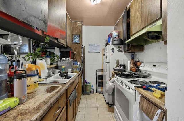 4139 46th St, San Diego, CA 92105 - kitchen featuring white appliances, under cabinet range hood, brown cabinets, wine cooler, and a textured ceiling